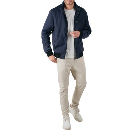 Blouson zippé marine uni avec une coupe droite...