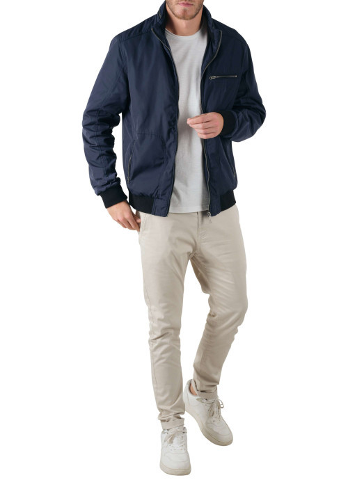 Blouson zippé marine uni avec une coupe droite et un col montant