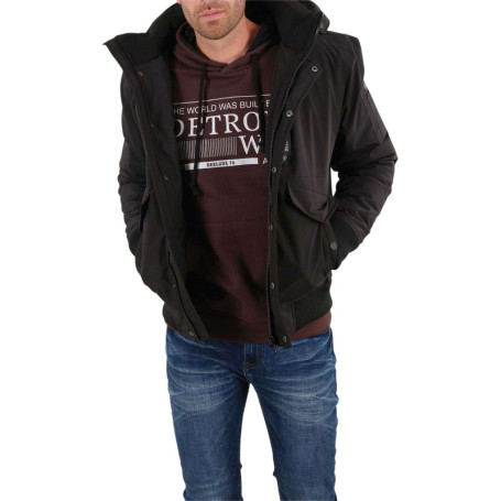 Blouson zippé noir uni avec une coupe droite et...