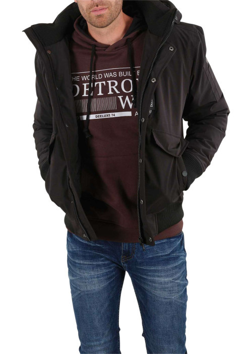 Blouson zippé noir uni avec une coupe droite et...