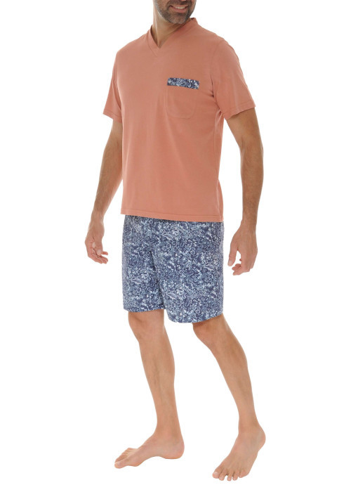 Pyjama court en coton orange avec un bas fleuri et une coupe fermée