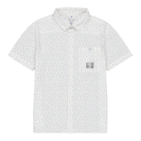 Chemise en coton blanche à pois avec une coupe...