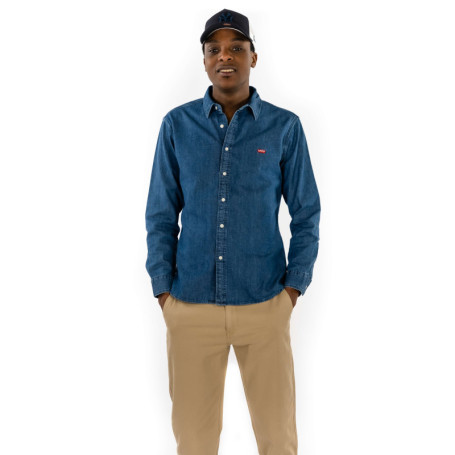 Chemise en coton indigo délavée avec un col...