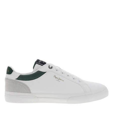 Tennis blanches avec un talon plat et munies...
