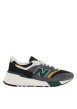 Thumbnail Baskets running noires, vertes et grises avec patch vert et lacets plats blancs