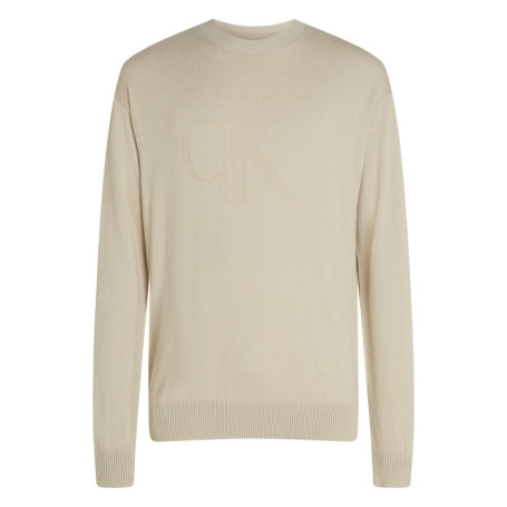 Pull en coton beige uni avec une coupe droite...