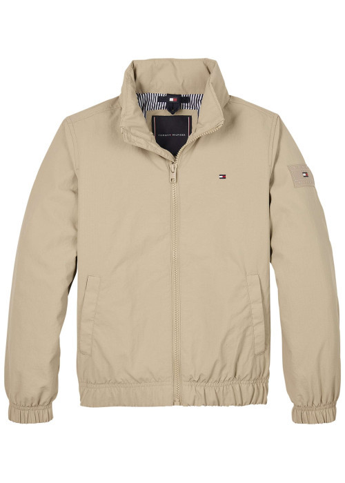 Veste beige uni avec une coupe droite à col montant et fermeture zippée