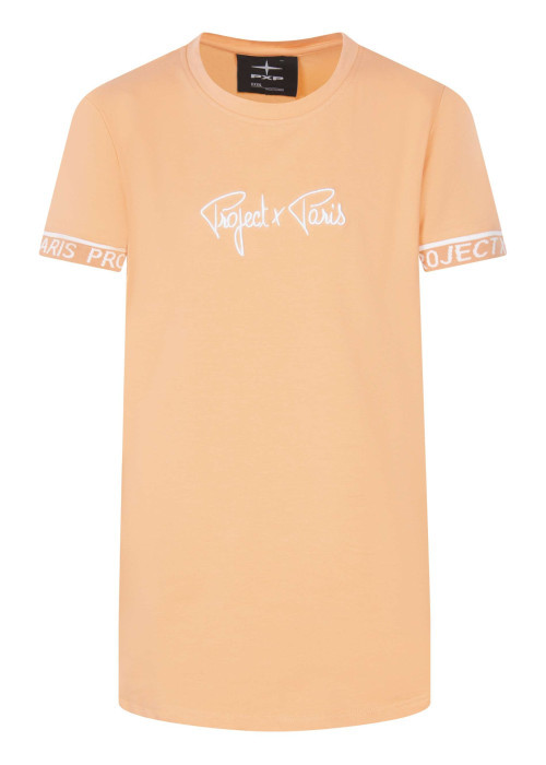 T-shirt pêche uni avec une coupe droite à col rond et des manches courtes