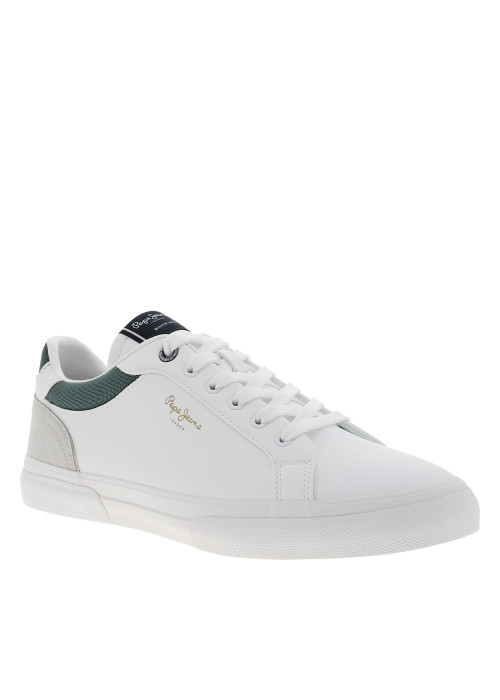 Tennis blanches avec un talon plat et munies...