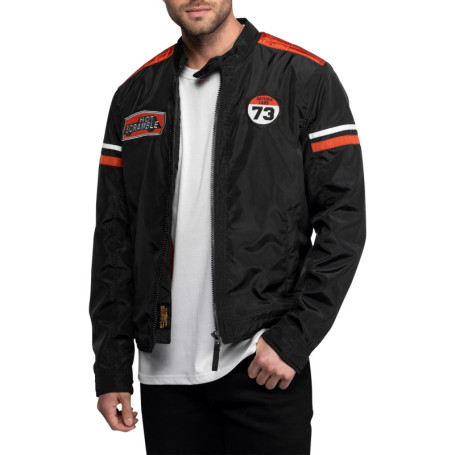 Blouson noir uni avec des détails oranges à...