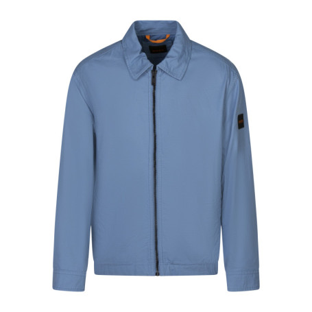 Blouson en coton bleu uni avec une coupe droite...