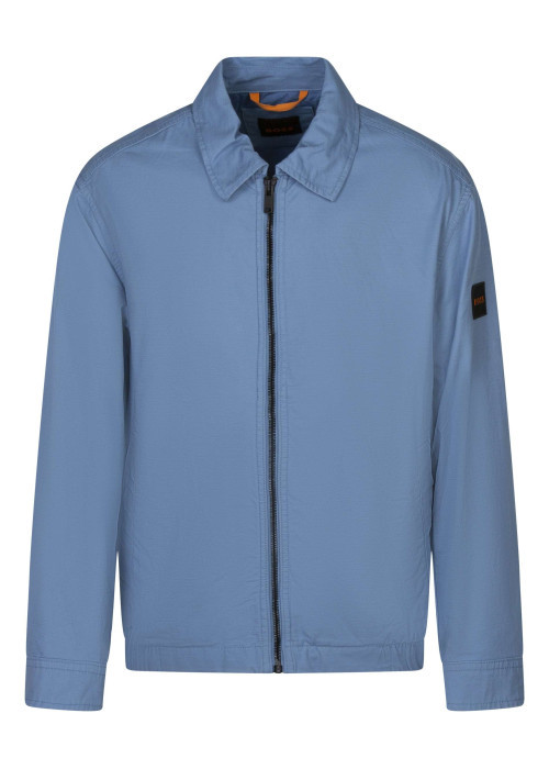 Blouson en coton bleu uni avec une coupe droite et un col à revers