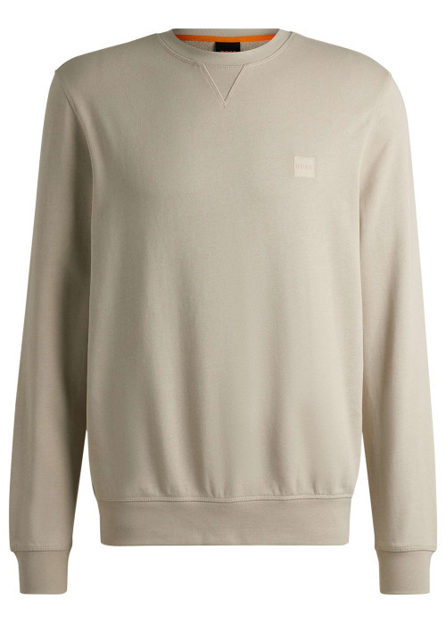 Sweat en coton beige uni avec une coupe regular fit et un patch à la poitrine