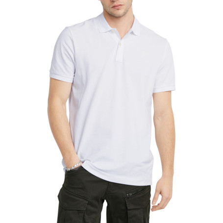 Polo en coton blanc uni avec une coupe droite...