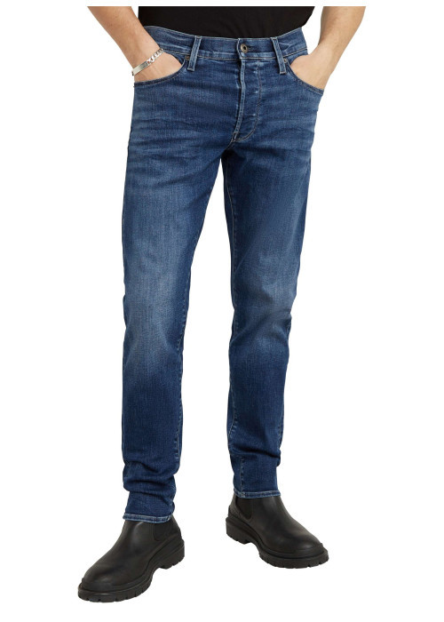 Jean en coton bleu avec des passants pour ceinture et une coupe slim