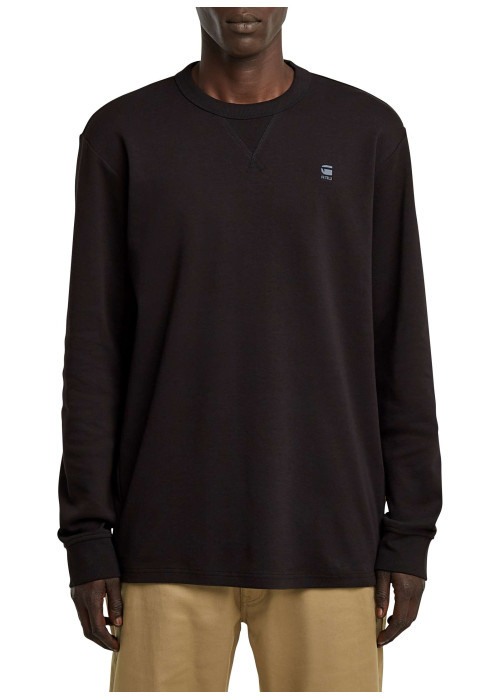 T-shirt en coton noir uni avec logo iconique sur la poitrine et un col rond