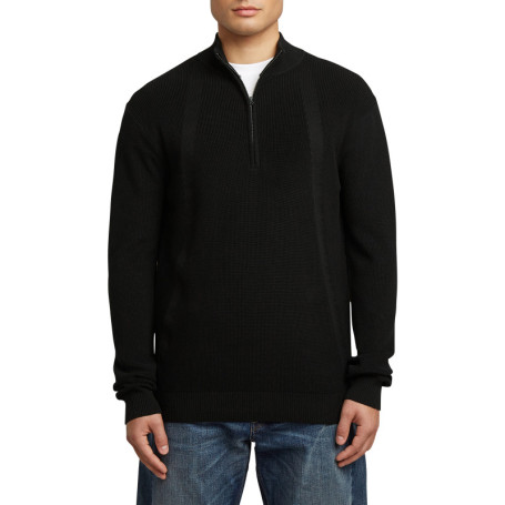 Pull en coton noir uni avec une coupe droite et...