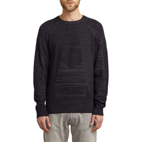 Pull noir uni avec des manches longues et une...