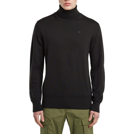 Pull en laine noir uni avec une coupe droite et...
