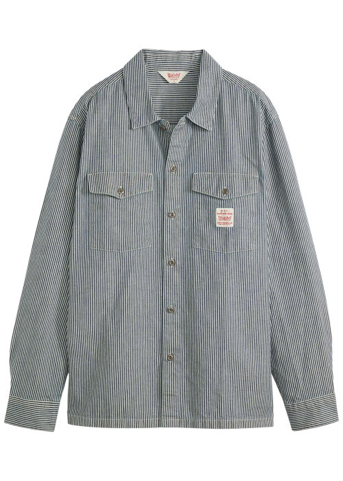 Chemise en coton rayée blanc et marine avec une fermeture par boutons