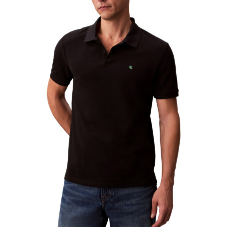 Polo en coton noir uni à coupe slim avec le...