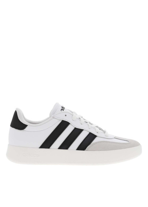 Tennis en cuir blanches avec semelle à talon plat et fermeture à lacets
