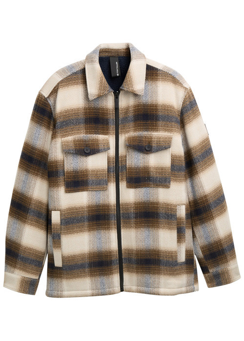 Veste beige à motif écossais avec un col...