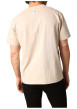 Thumbnail T-shirt en coton beige uni avec un col rond et des manches courtes - Image 2