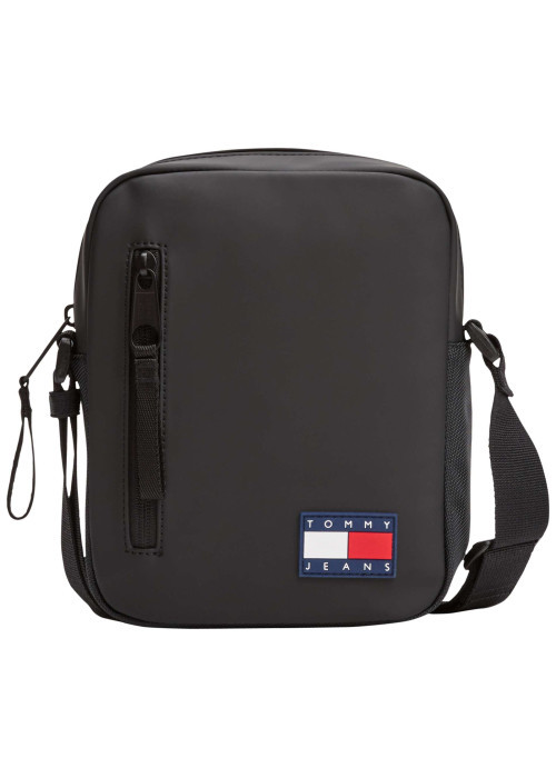 Sacoche noire unie avec un patch d'authenticité à l'avant et un zip