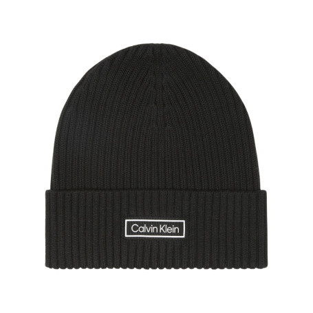 Bonnet en coton noir uni avec un revers sur le...