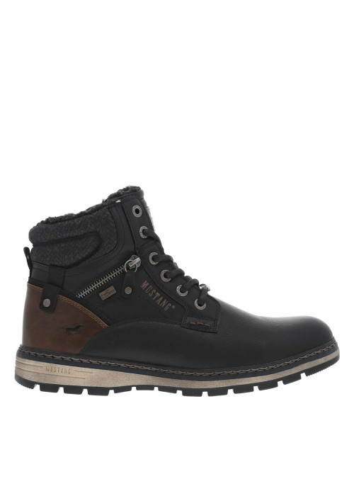 Bottines noires à talon plat pourvues d'une...