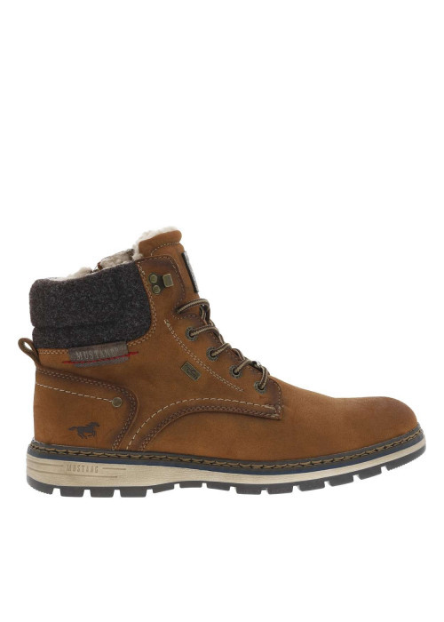 Bottines cognac à talon plat pourvues d'une...