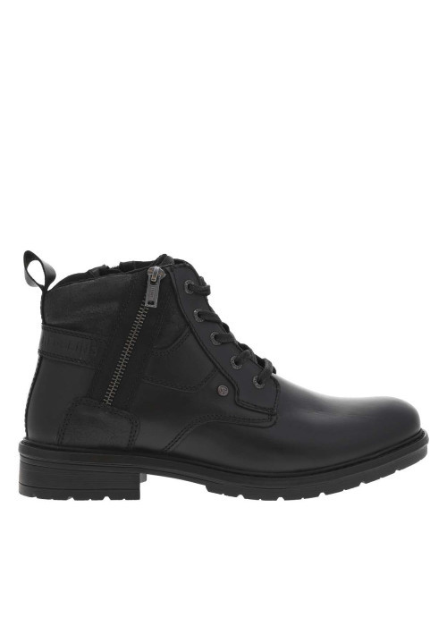 Bottines en cuir noires à talon décroché bas pourvues d'un zip latéral