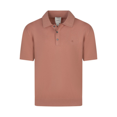 Polo rose uni en coton avec une coupe droite et...