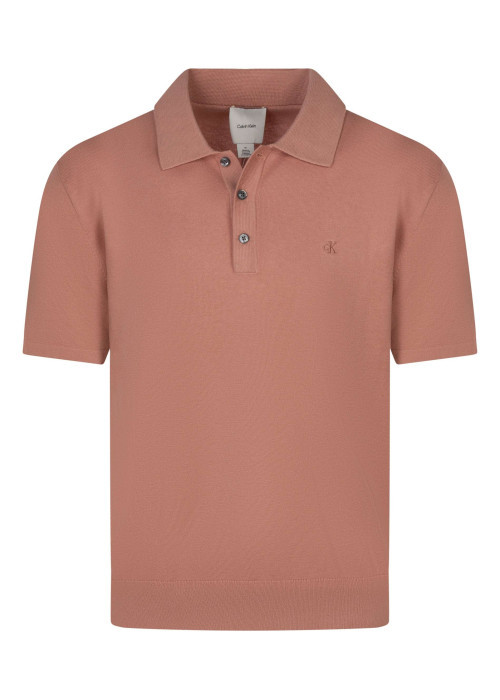 Polo rose uni en coton avec une coupe droite et un col à rabats