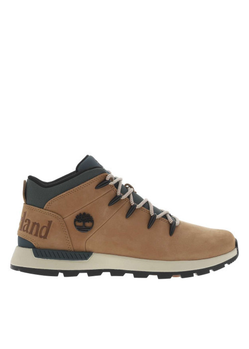 Bottines en cuir nubuck brunes avec un talon plat et des lacets ronds