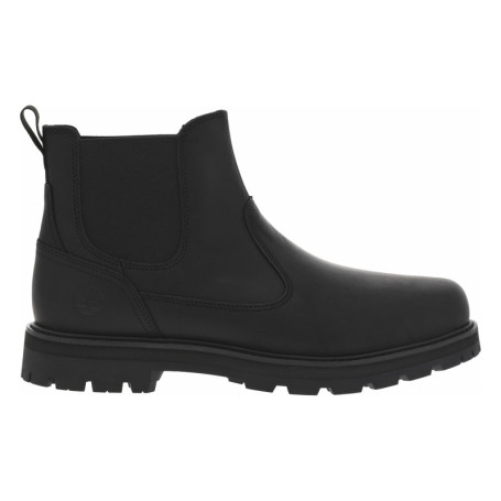 Boots en cuir noires avec un talon plat et des...
