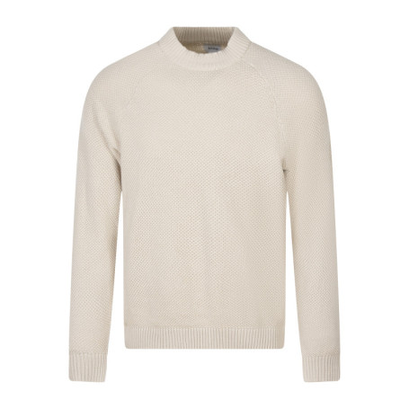 Pull en coton beige uni avec une coupe ajustée...