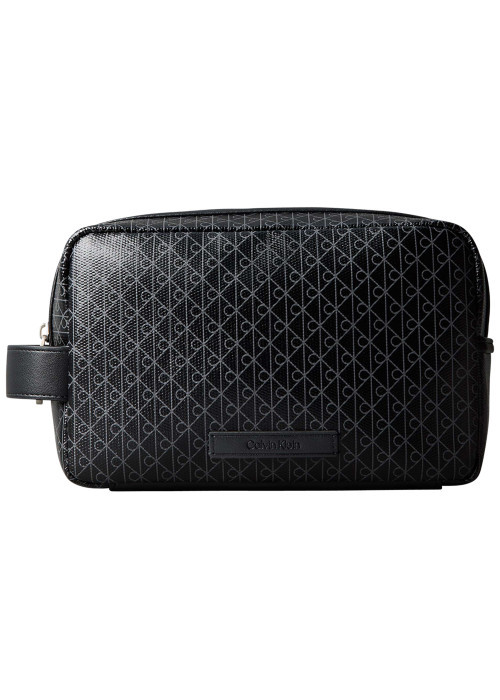 Trousse noire à motifs monogrammes de la marque...