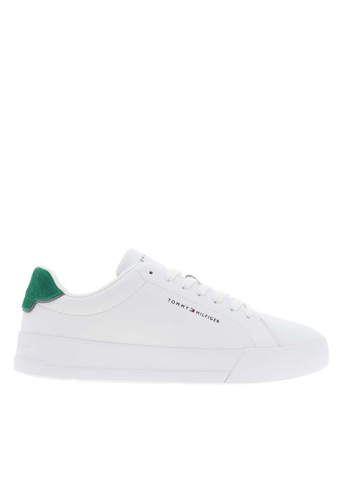 Tennis en cuir blanches et vertes à talon plat avec des lacets