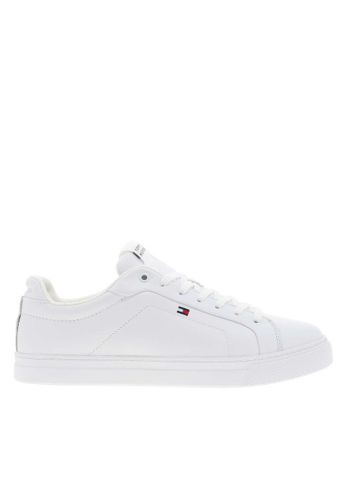 Tennis en cuir blanc à talon plat avec des lacets et un logo brodé