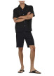 Thumbnail Chemise en coton noire unie avec une coupe droite et un col à revers - Image 6