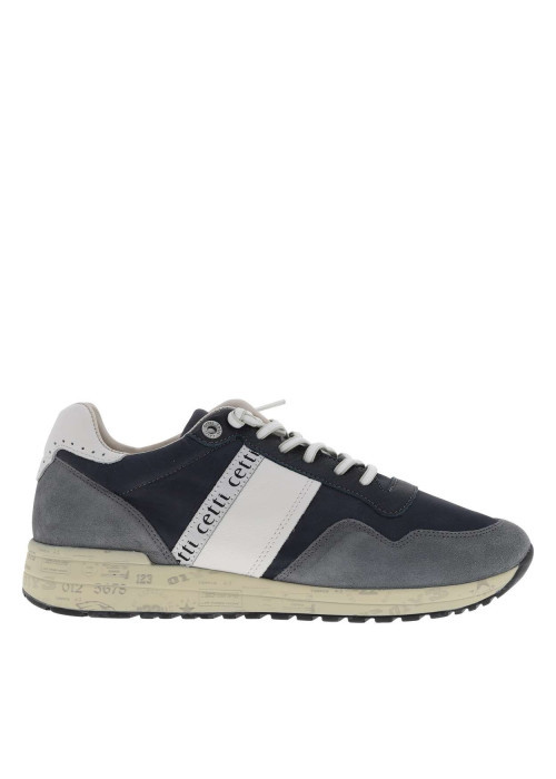 Baskets en cuir marine avec des lacets ronds et des motifs sur la semelle