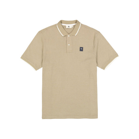 Polo en coton beige uni avec une coupe droite...