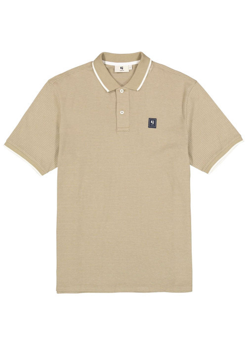 Polo en coton beige uni avec une coupe droite et un col à revers