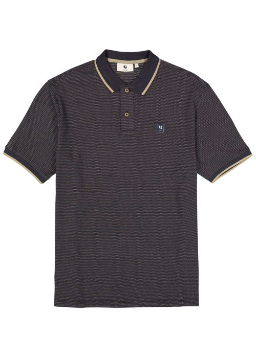 Polo en coton bleu marine uni avec une coupe droite et un col à revers
