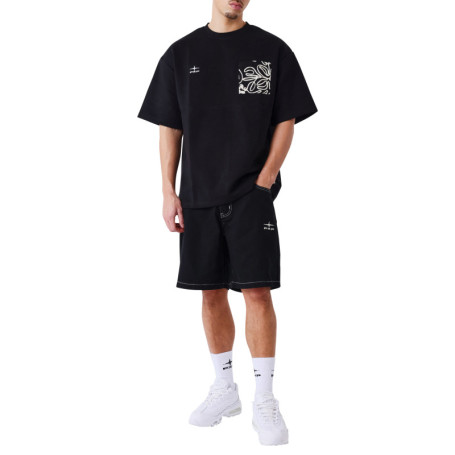 Short en coton noir uni pourvu de multiples...
