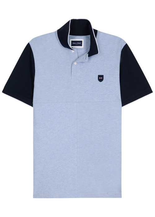 Polo en coton bleu uni avec une coupe droite et un col à revers