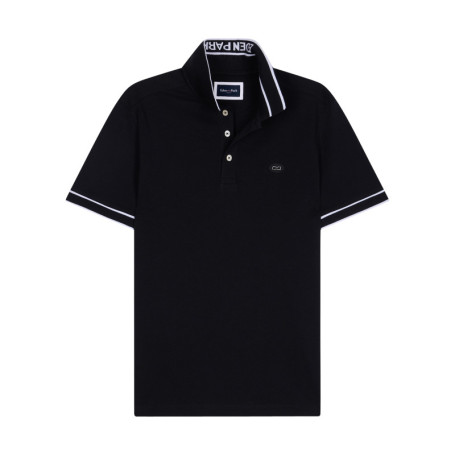Polo en coton noir uni avec une coupe droite et...