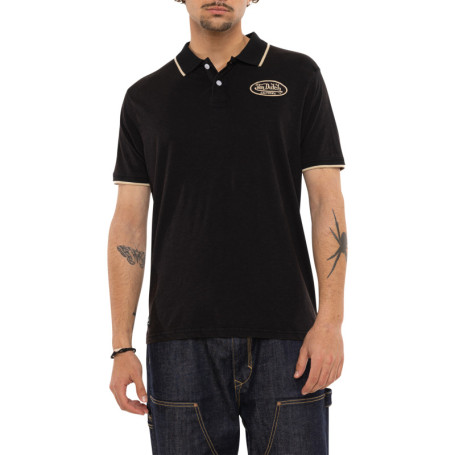 Polo en coton noir uni avec une coupe droite et...